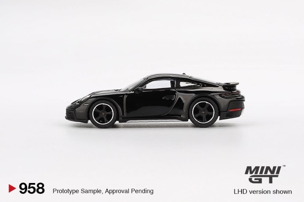 Xe mô hình Mini GT MGT00958 Porsche 911 Dakar Black - ảnh 1