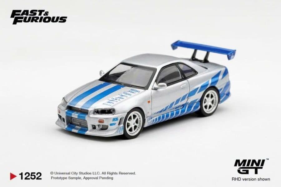 Xe mô hình Mini GT MGT01252-BL Nissan Skyline GT-R C-West 2 Fast 2 Furious Brian O’Conner